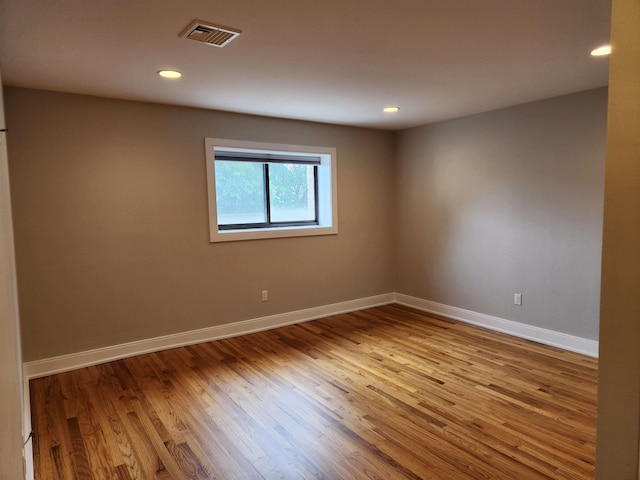 86 W 33rd St Unit 207, Bayonne, NJ 07002 - unfurnished room with wood finished floors and recessed lighting