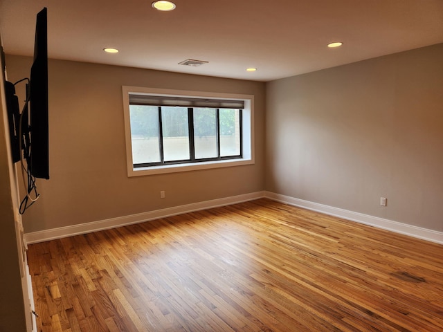 86 W 33rd St Unit 207, Bayonne, NJ 07002 - unfurnished room featuring wood finished floors and recessed lighting