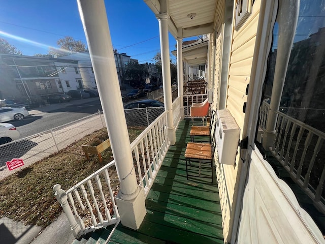 balcony featuring covered porch