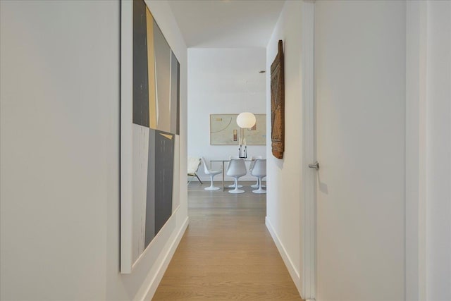 75 Park Ln S Unit 3202, Jersey City, NJ 07310 - hall featuring light wood finished floors and baseboards