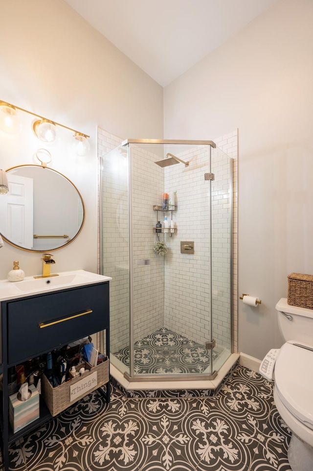 bathroom featuring lofted ceiling, a shower with shower door, tile patterned floors, and toilet