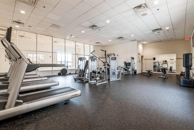 gym featuring a paneled ceiling