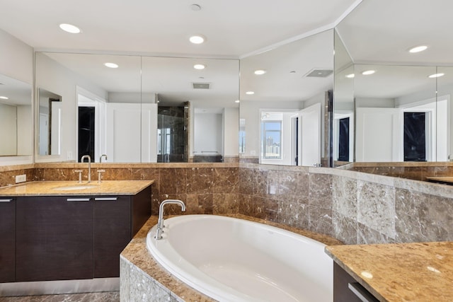 8100 River Rd Unit 1215, North Bergen, NJ 07047 - bathroom with a garden tub, vanity, and recessed lighting