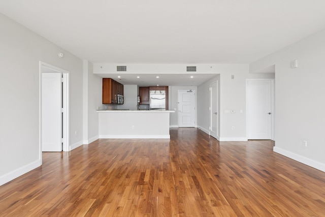 8100 River Rd Unit 1215, North Bergen, NJ 07047 - unfurnished living room with wood finished floors and baseboards