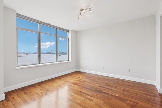 8100 River Rd Unit 1215, North Bergen, NJ 07047 - spare room with wood finished floors