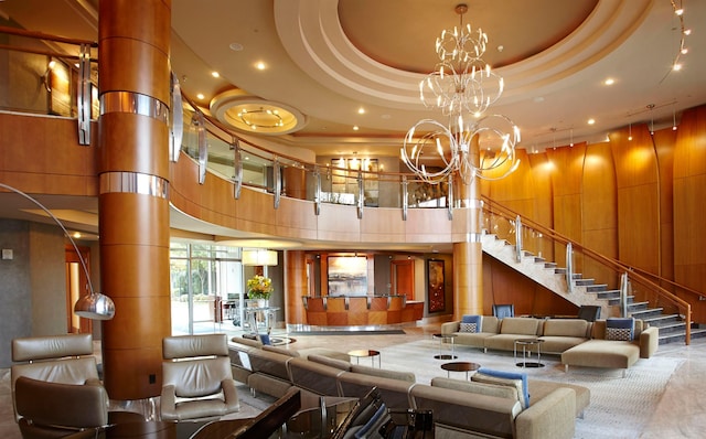 8100 River Rd Unit 1215, North Bergen, NJ 07047 - community lobby featuring a towering ceiling, wood walls, and recessed lighting