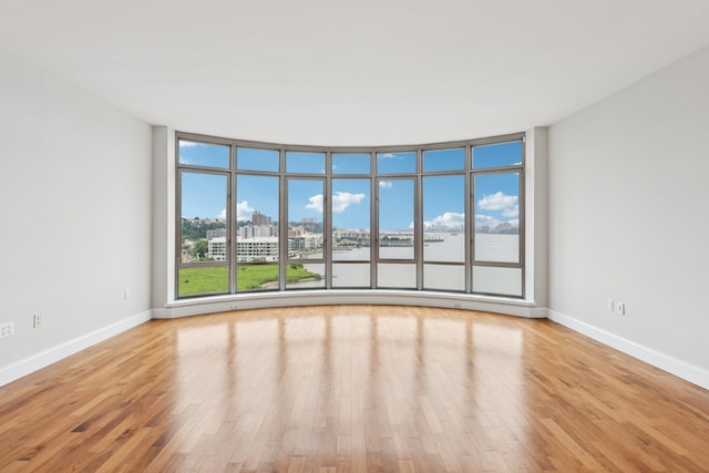 8100 River Rd Unit 1215, North Bergen, NJ 07047 - empty room with wood finished floors, a city view, and a water view