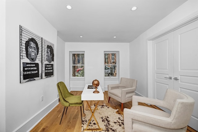 living area with wood-type flooring