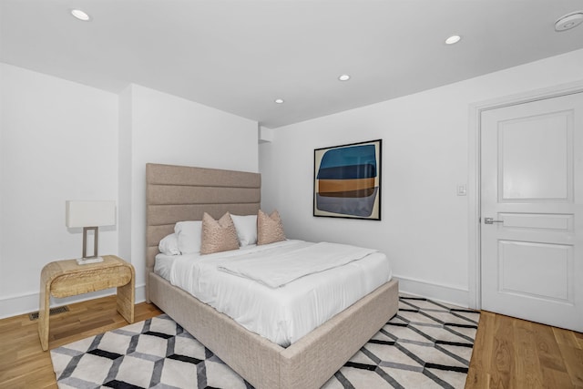 bedroom with light wood-type flooring