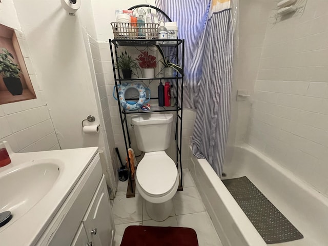 bathroom with toilet, vanity, and shower / bath combination with curtain