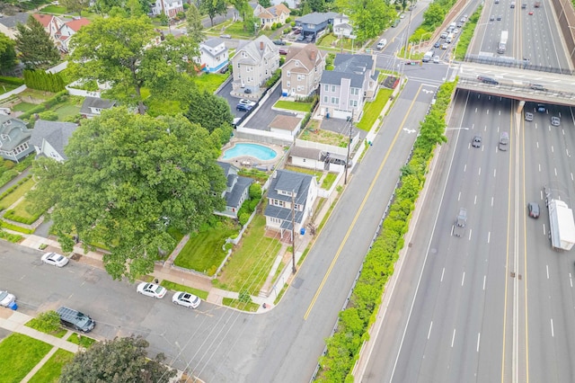 115 Wilson Ave, Rutherford, NJ 07070 - aerial view of property and surrounding area featuring nearby suburban area, a major roadway, and a pool