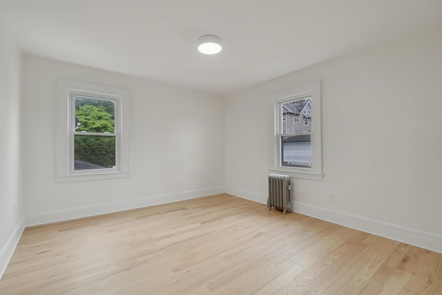 115 Wilson Ave, Rutherford, NJ 07070 - unfurnished room with radiator, light wood-style floors, and baseboards