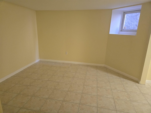 29 48th St, Weehawken, NJ 07086 - spare room with light tile patterned floors and baseboards