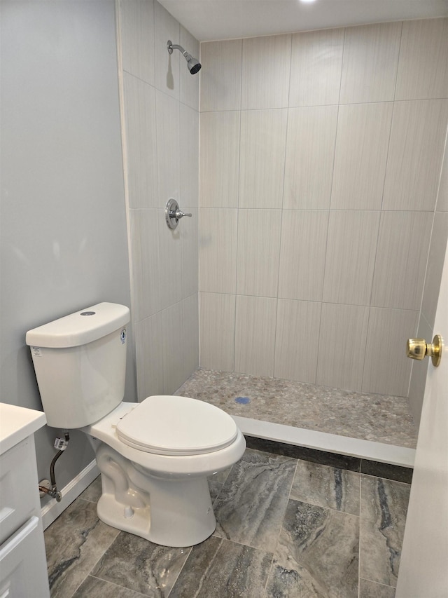 29 48th St, Weehawken, NJ 07086 - bathroom featuring a tile shower and toilet