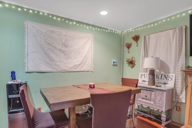 dining area featuring wood-type flooring