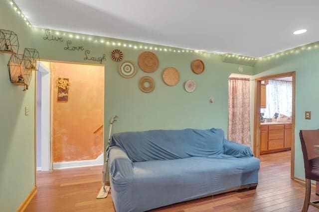 living room with light hardwood / wood-style flooring