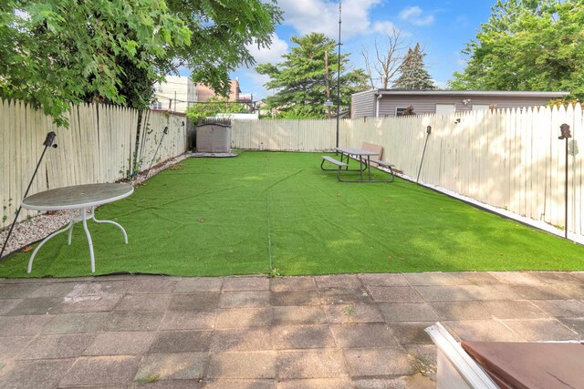 9 E 15th St, Bayonne, NJ 07002 - fenced backyard featuring a patio