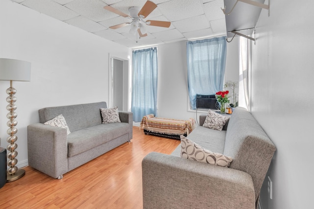 9 E 15th St, Bayonne, NJ 07002 - living area with ceiling fan and light wood-type flooring