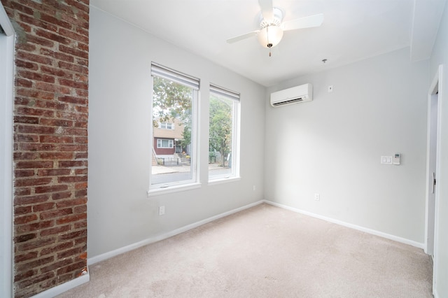 empty room featuring a ceiling fan, an AC wall unit, light carpet, and baseboards