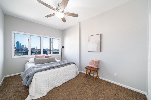 bedroom with carpet flooring and ceiling fan