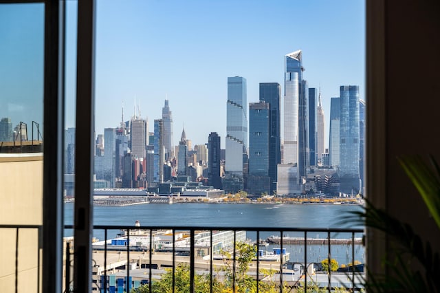 property's view of city with a water view