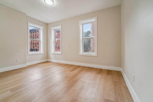 450 1st St Unit 2, Hoboken, NJ 07030 - spare room with light wood-style flooring and baseboards