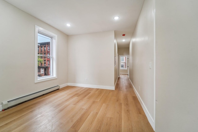 450 1st St Unit 2, Hoboken, NJ 07030 - empty room with light wood-style flooring, baseboard heating, recessed lighting, and baseboards