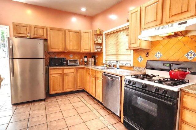 7502 Cottage Ave, North Bergen, NJ 07047 - kitchen featuring stainless steel appliances, under cabinet range hood, a sink, light countertops, and open shelves