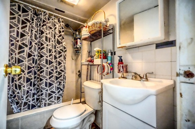 7502 Cottage Ave, North Bergen, NJ 07047 - bathroom with tile walls, vanity, tiled shower, backsplash, and toilet