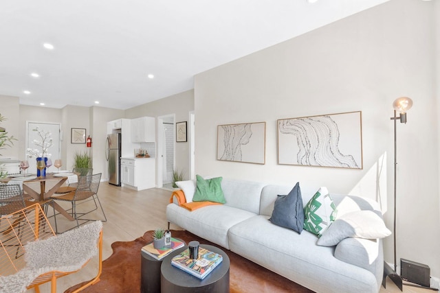82 E 24th St, Bayonne, NJ 07002 - living room with recessed lighting and light wood-type flooring