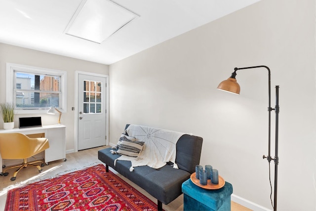82 E 24th St, Bayonne, NJ 07002 - sitting room featuring attic access, light wood finished floors, and baseboards