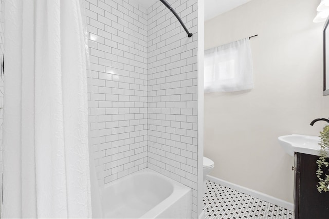 82 E 24th St, Bayonne, NJ 07002 - bathroom with vanity, toilet, shower / bathtub combination with curtain, and baseboards