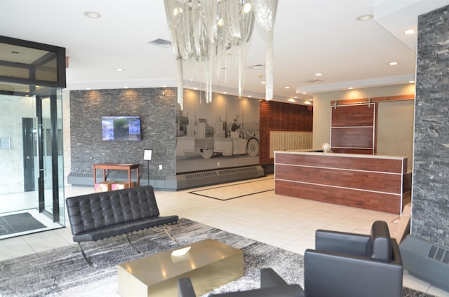 welcome area with visible vents and a chandelier