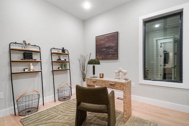 office area with recessed lighting, baseboards, and wood finished floors