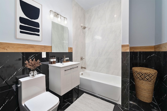 21 Hancock Ave Unit 1, Jersey City, NJ 07307 - bathroom with tile walls, vanity, shower / washtub combination, and a wainscoted wall