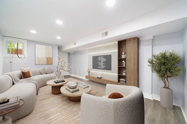 21 Hancock Ave Unit 1, Jersey City, NJ 07307 - living room with wood finished floors and recessed lighting