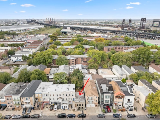 birds eye view of property featuring a city view