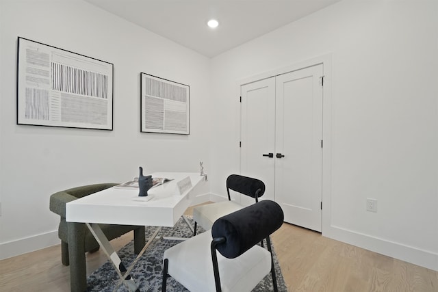 office with recessed lighting, baseboards, and light wood-style floors