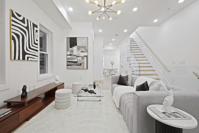 living area with recessed lighting, an inviting chandelier, and stairs