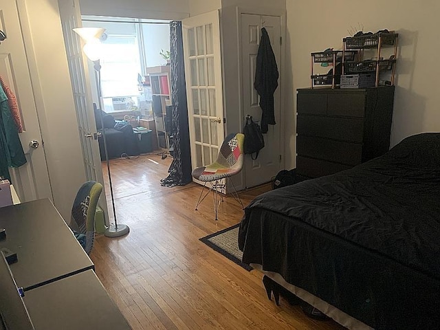 bedroom with light wood-style floors