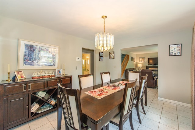 20 Bryant Ave, Bloomfield, NJ 07003 - dining area with a chandelier and light tile patterned floors