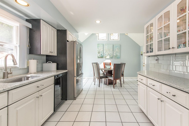 20 Bryant Ave, Bloomfield, NJ 07003 - kitchen featuring freestanding refrigerator, black dishwasher, backsplash, white cabinetry, and recessed lighting