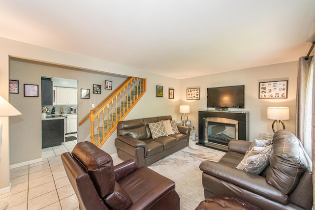 20 Bryant Ave, Bloomfield, NJ 07003 - living room featuring stairway, light tile patterned floors, and a glass covered fireplace