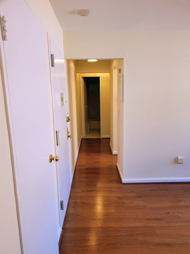 hall featuring dark hardwood / wood-style flooring