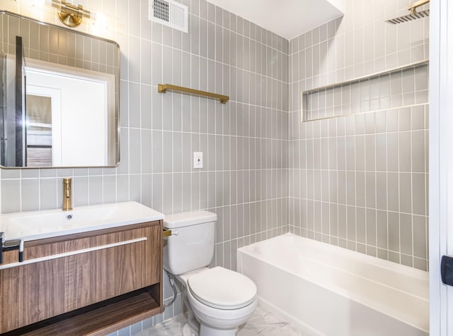 141 Sherman Ave Unit 1, Jersey City, NJ 07307 - full bath featuring tile walls, vanity, marble finish flooring, and shower / bathtub combination
