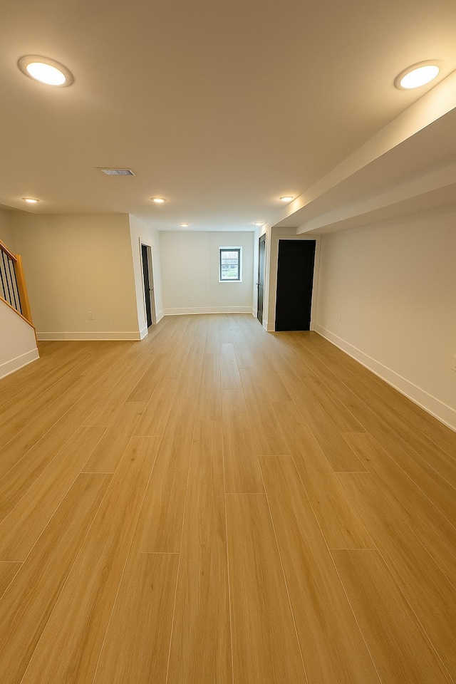 141 Sherman Ave Unit 1, Jersey City, NJ 07307 - unfurnished room featuring light wood-style floors, stairs, and recessed lighting