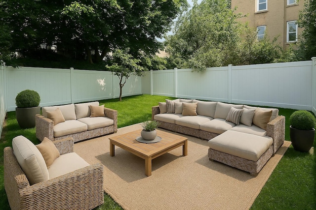 141 Sherman Ave Unit 1, Jersey City, NJ 07307 - fenced backyard with an outdoor hangout area and a patio
