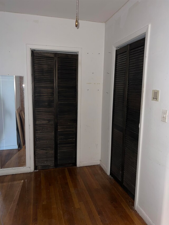 hall featuring dark hardwood / wood-style flooring