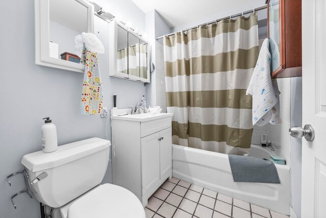 full bathroom with wood-type flooring, vanity, shower / bath combination with curtain, and toilet