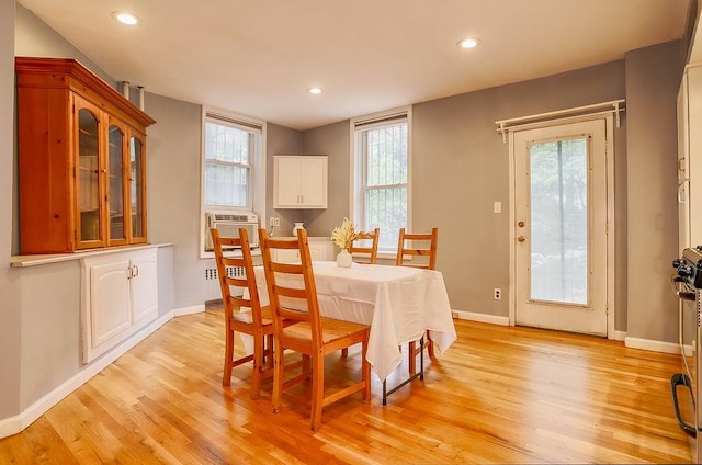 940 Bloomfield St # 1, Hoboken, NJ 07030 - dining space featuring light wood-type flooring, recessed lighting, cooling unit, and radiator
